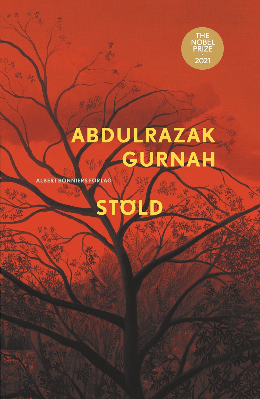 Omslag i rött med silhuett av trädgrenar och gul text, med Nobelprisets logotyp.