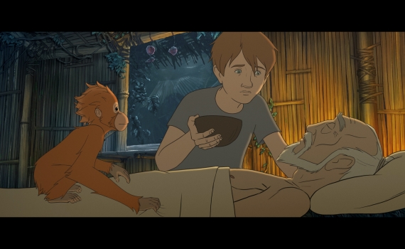 En pojke ger en skål med vätska till en äldre man som ligger i en bambuhydda. En orangutang tittar på.